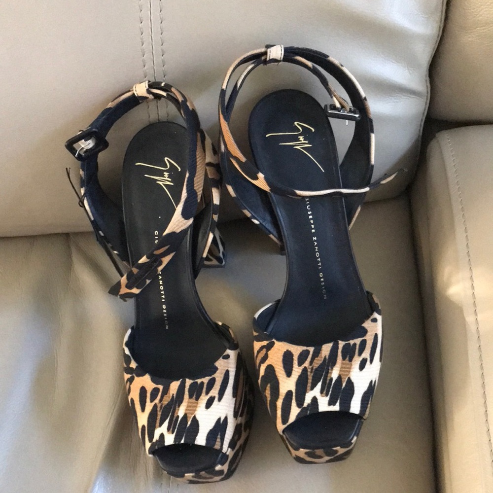Designer animal print sandals. New and never worn. Ankle strap. Size 8 & 1/2.